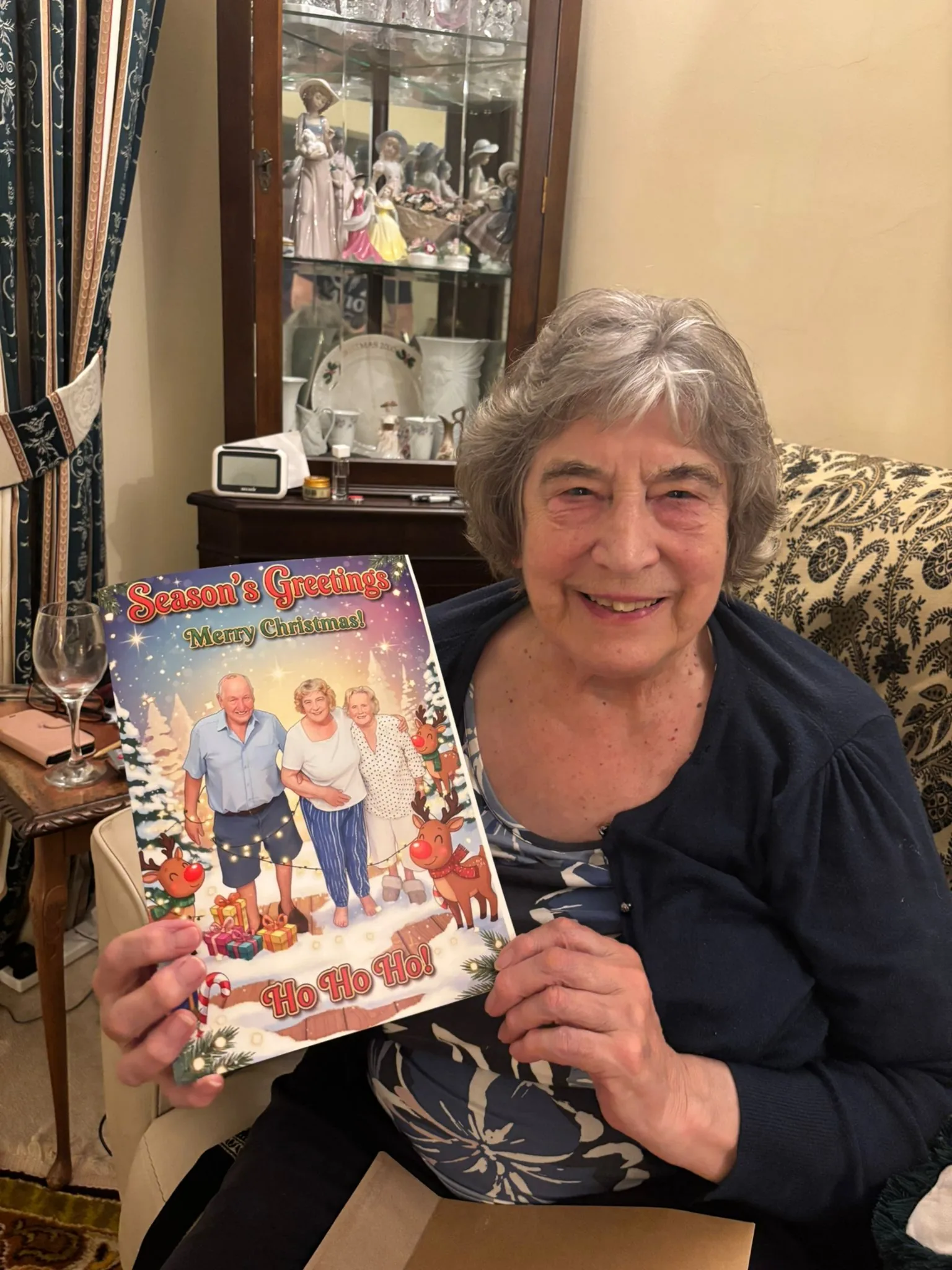 Grandmother holding her personalised card